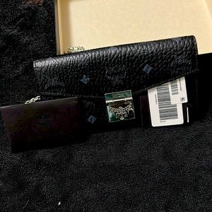 BLACK MCM CLUTCH